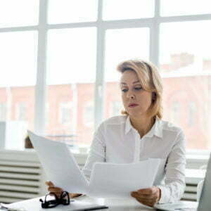 a woman sitting at a desk