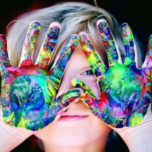 a person with the hands on the face